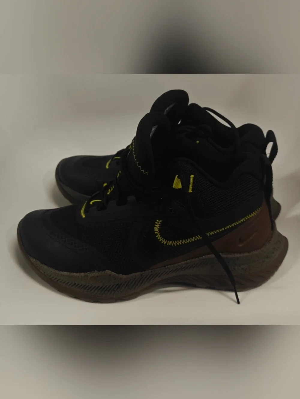 Nike Men's Black Sneakers with Yellow Accents and Brown Heel